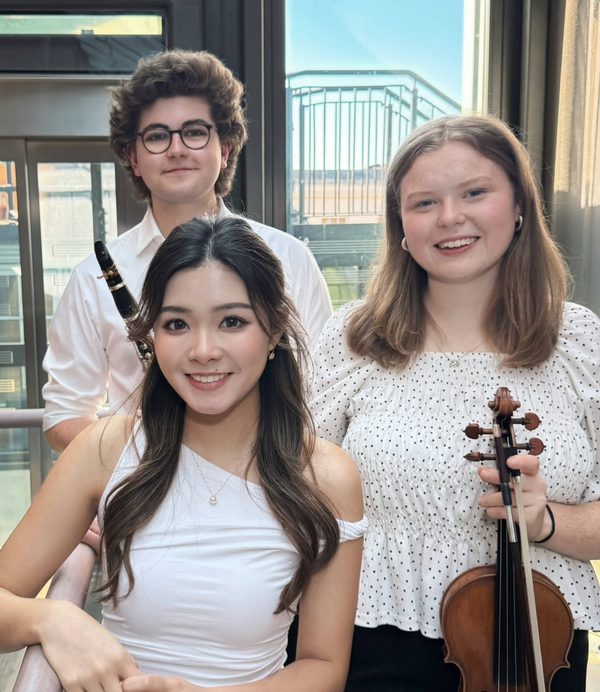 Elizabeth Peat holding a violin Eliott Berdugo and Sin U Sou