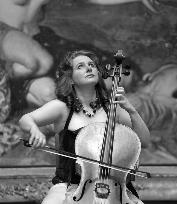 Hannah Roberts playing cello looking up at the ceiling