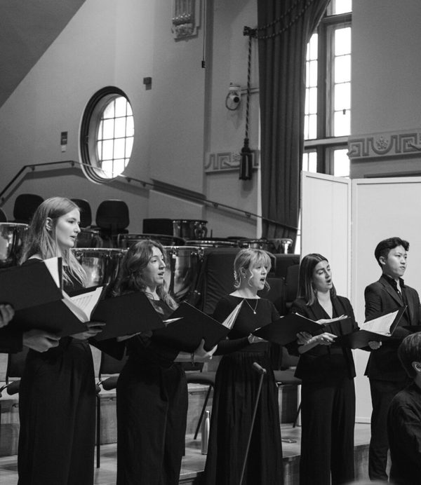 choir singing in black and white