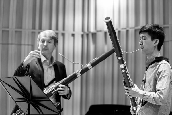 A bassoon teacher and student.