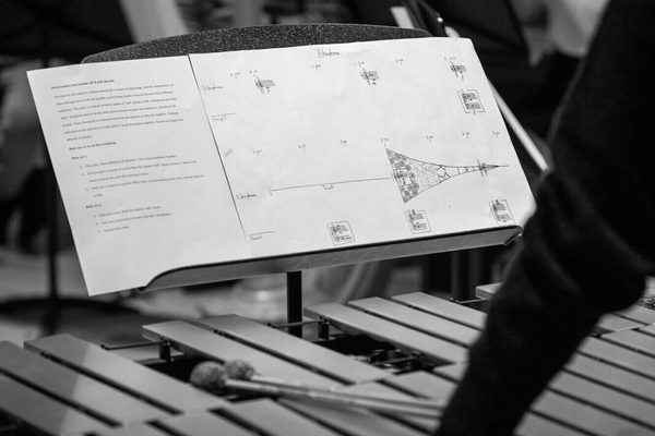Sheet music in front of a xylophone.