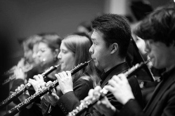 An oboe player in rehearsal.