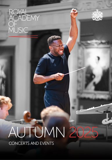 The front cover of the Royal Academy of Music's autumn diary publication, featuring an image of conductor Roderick Cox in rehearsal with students