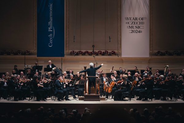 Musicians on stage performing at Carnegie Hall
