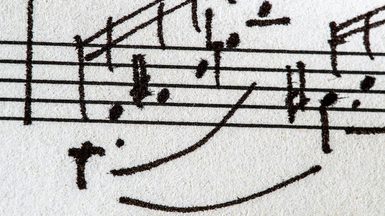 An extract of hand drawn musical notes on a musical stave
