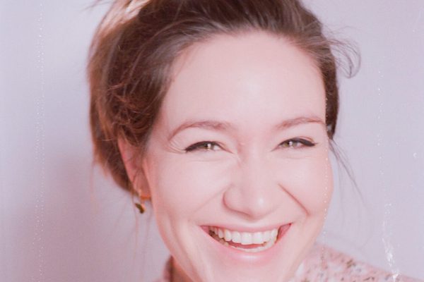Portrait of Freya Waley-Cohen smiling