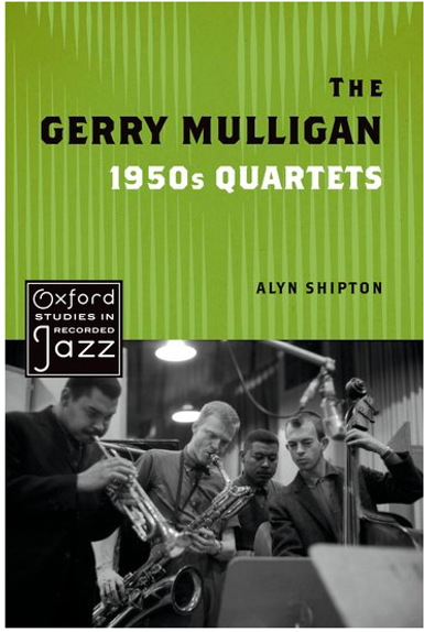 A group of jazz brass players leaning towards sheet mid-performance