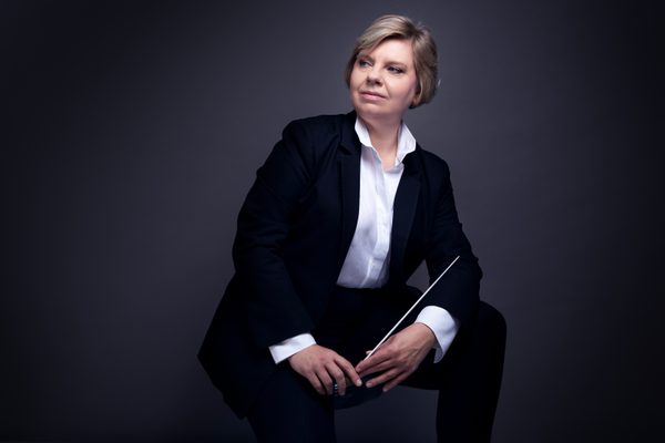 Lada Valesova sits holding a baton