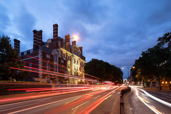 Image of the facade of the Royal Academy of Music at night time.