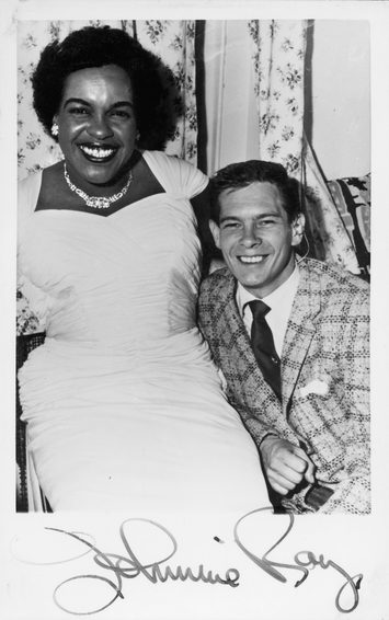 Winifred Atwell sits with Johnnie Ray
