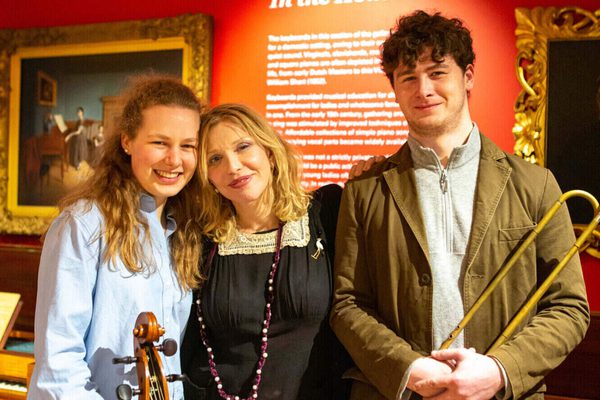Courtney Love poses with Academy students in the museum