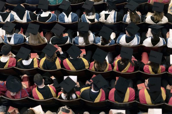 Top-down view of an audience of graduands.