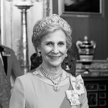 The Duchess of Gloucester smiles to camera.