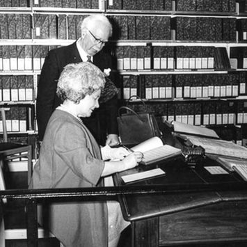 Queen Elizabeth II in a library.