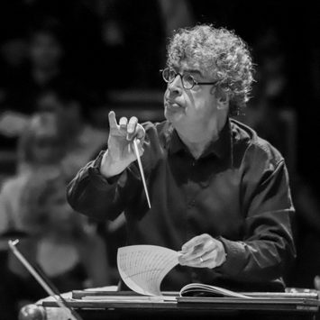 A conductor, mid-concert.