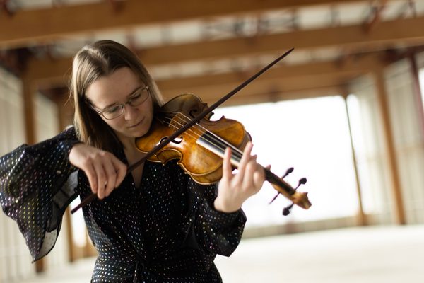 A violin player.