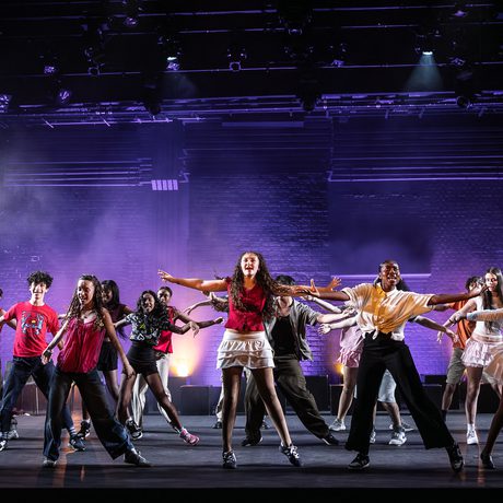 Junior Academy Musical Theatre students perform on stage.