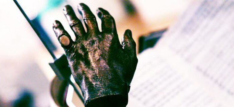 Close up of a sculpted metal hand, part of the Sir John and Evelyn Barbirolli Collections.