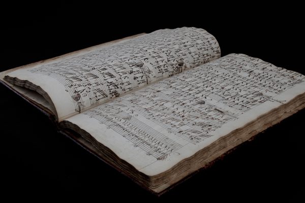 An open manuscript.
