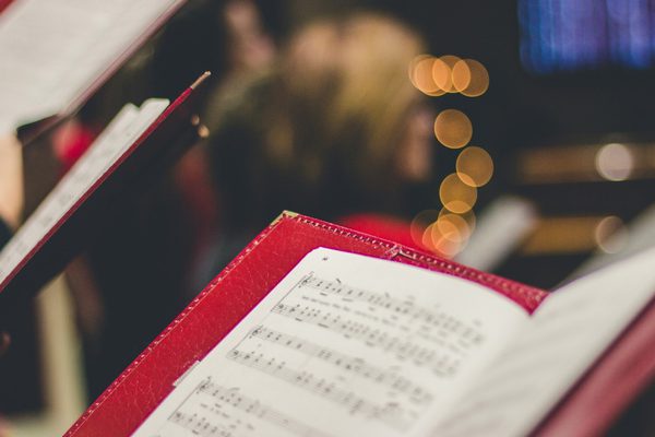 Close-up of the corner of a leatherbound musical manuscript.