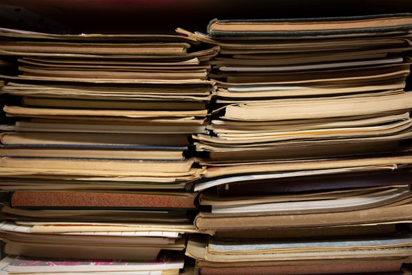 Two stacks of manuscripts from the side.