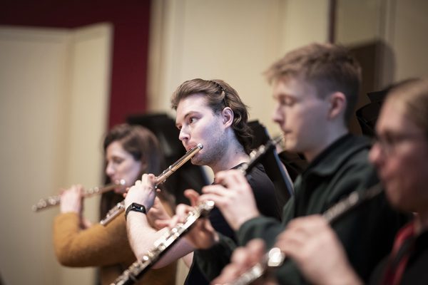A flute section in rehearsal.