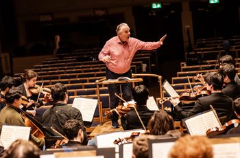 Sir Mark Elder in rehearsal with the Academy Symphony Orchestra.