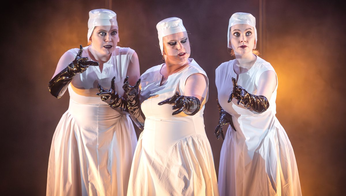 An opera trio on stage.