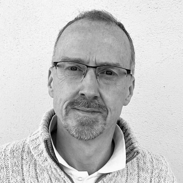 Black and white portrait image of Andrew Smith