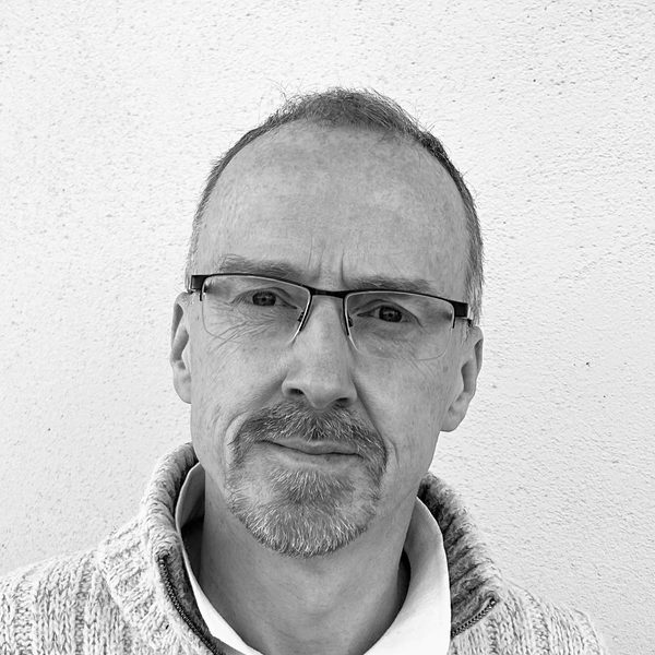 Portrait of Andrew Smith looking to camera.