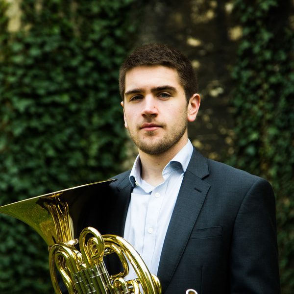 Ben Hulme holding a horn.