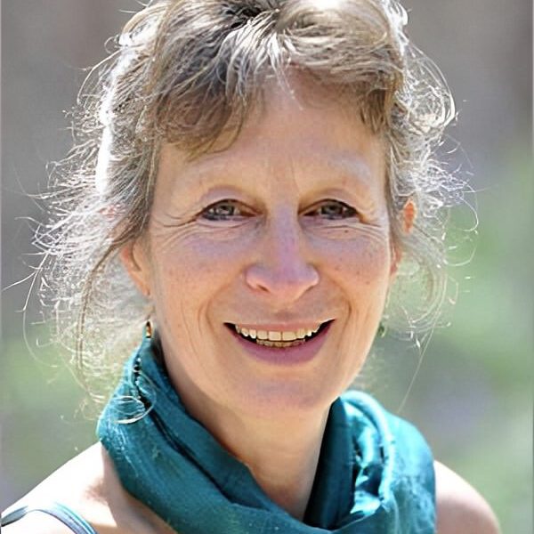 Close up of Charlotte Seale posing for camera, standing outside
