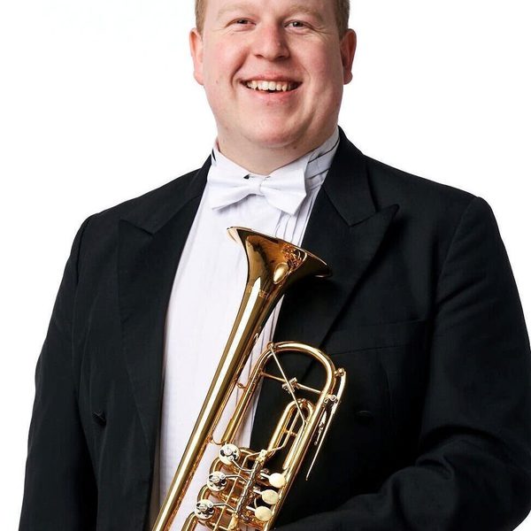Picture of Christopher Hart holding a trumpet