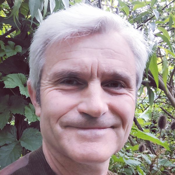 David Antrobus smiles to camera.