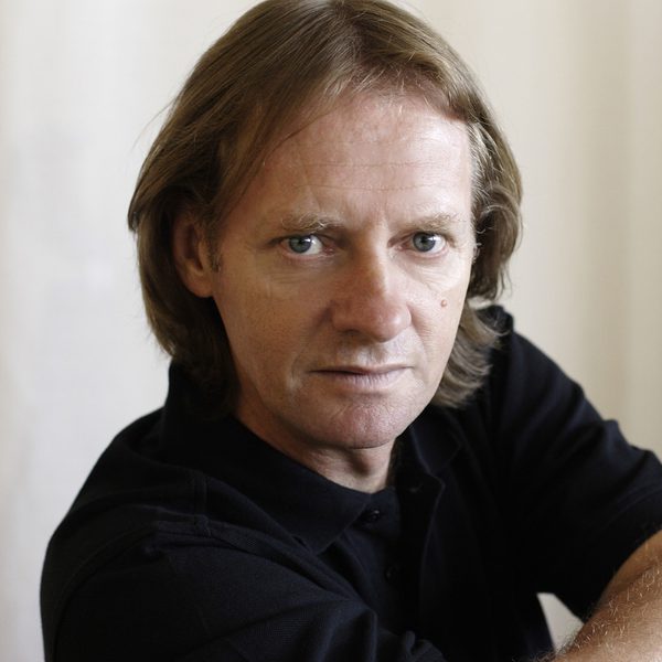 Guitarist David Russell looking into the camera.