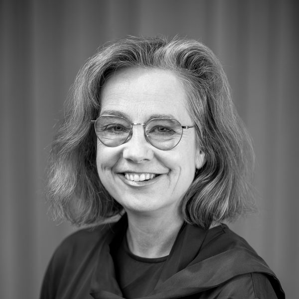Profile of Elizabeth Kenny smiling to camera.