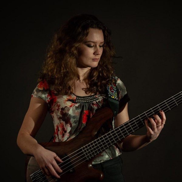 Flo Moore playing the double bass.