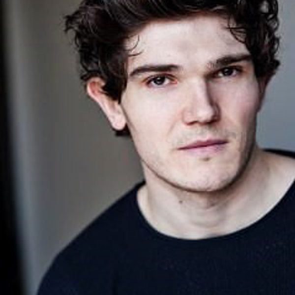 Portrait of Fra Fee looking to camera.