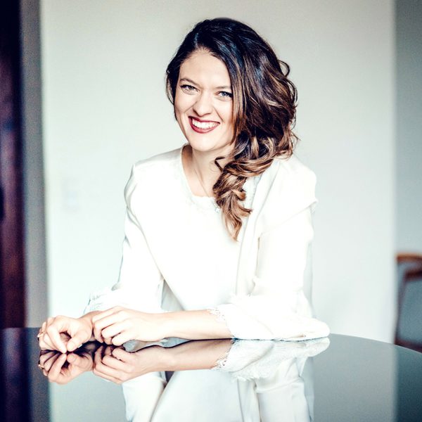 Image of Francesca Orlando sat at a piano.