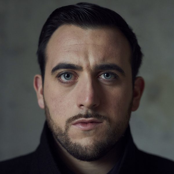 Portrait of Freddie De Tommaso looking to camera.