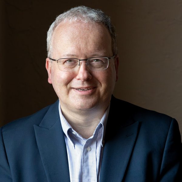 Headshot of Iain Quinn looking to camera