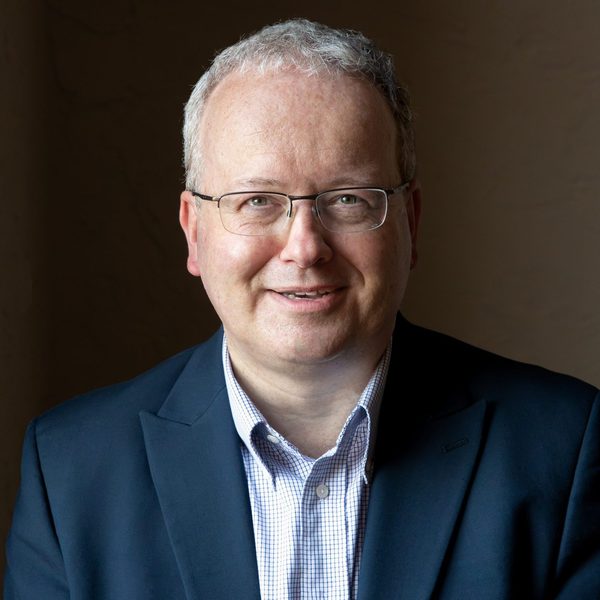 Headshot of Iain Quinn looking to camera