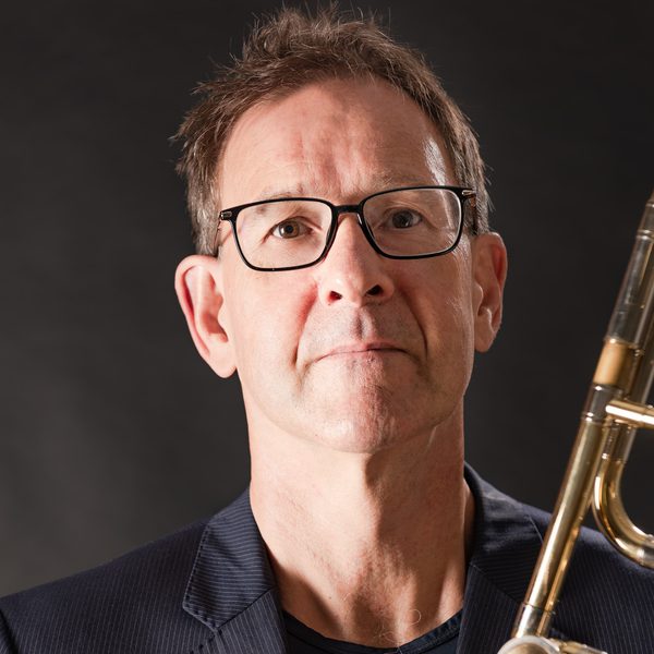 Ian Bousfield poses with a trombone