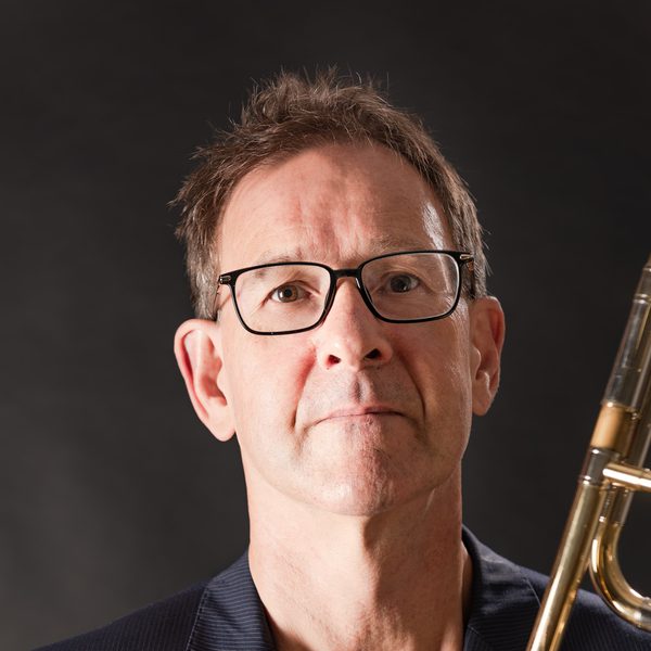 Ian Bousfield poses with a trombone.