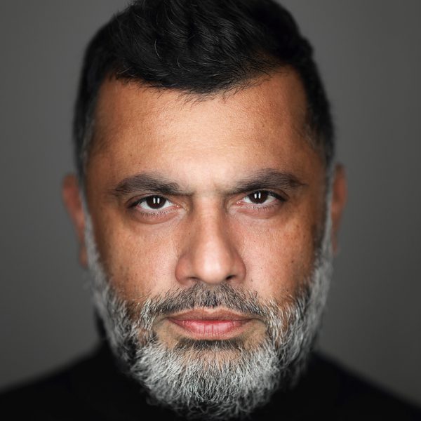 Irvine Iqbal looks to camera.