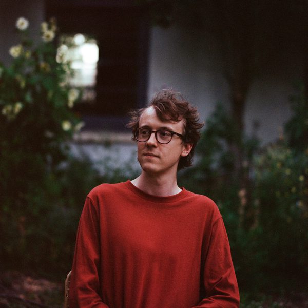 Joseph Havlat looks whimsically off camera.