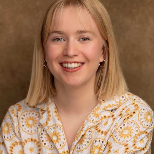 Josie Griffiths smiles to camera.