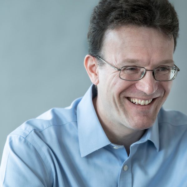 Julian Perkins smiling.