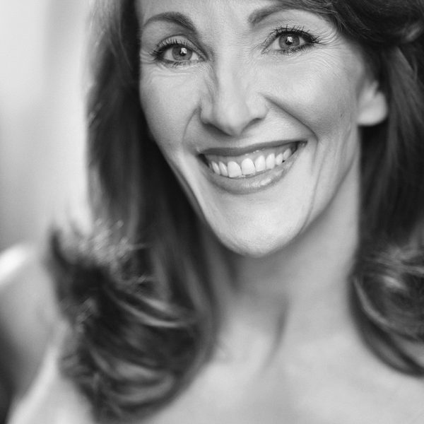 Portrait of Kate Graham smiling to camera.