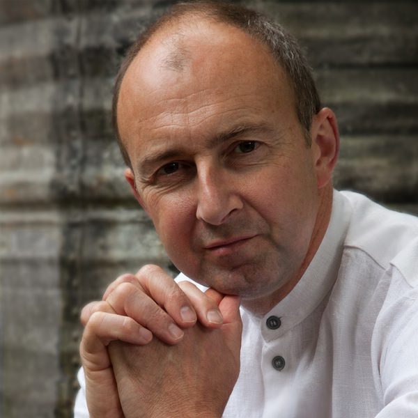 Martin Outram portrait with hands clasped